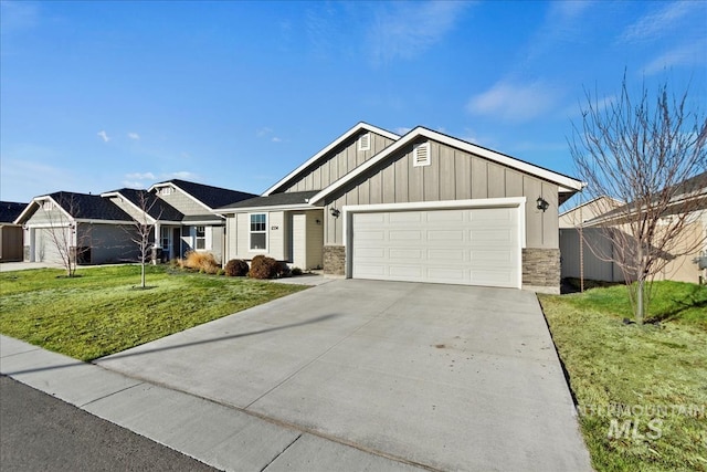 view of front of property with a garage and a front yard