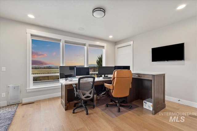 office with recessed lighting, baseboards, and light wood-style floors