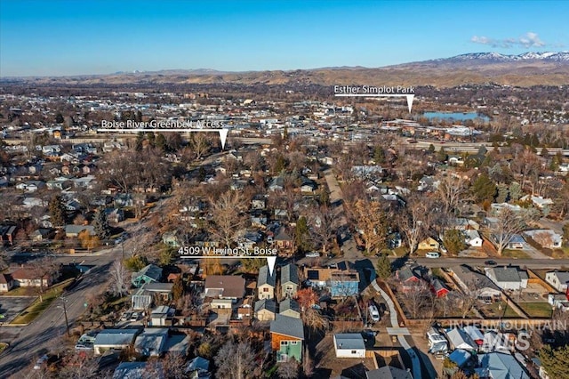 birds eye view of property with a mountain view