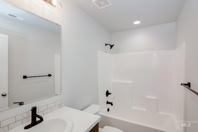 full bath with toilet, bathing tub / shower combination, vanity, and visible vents