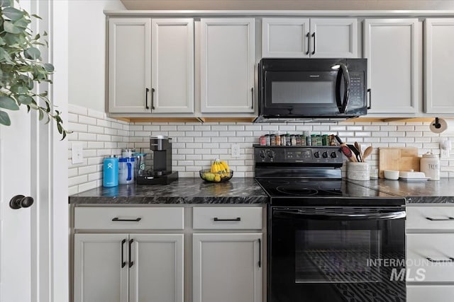 kitchen with white cabinets, backsplash, and black appliances