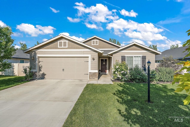13221 S Clarion River Ave, Nampa, ID 83686 - view of front of house featuring a garage and driveway