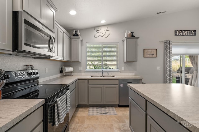 13221 S Clarion River Ave, Nampa, ID 83686 - kitchen featuring appliances with stainless steel finishes, gray cabinets, a sink, recessed lighting, and light countertops