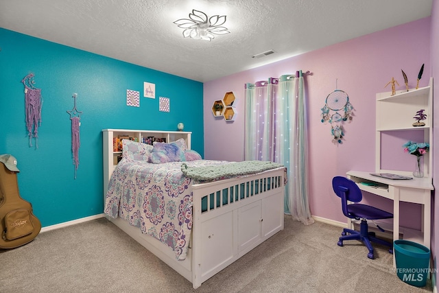 13221 S Clarion River Ave, Nampa, ID 83686 - bedroom featuring carpet flooring, a textured ceiling, baseboards, and a desk