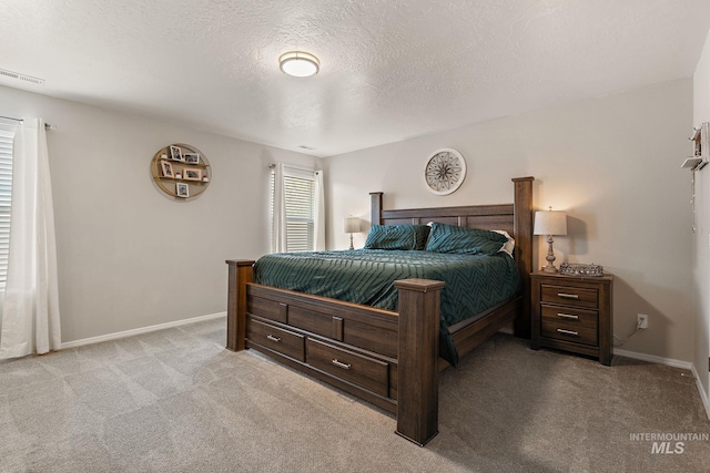 13221 S Clarion River Ave, Nampa, ID 83686 - bedroom featuring light carpet, baseboards, and a textured ceiling