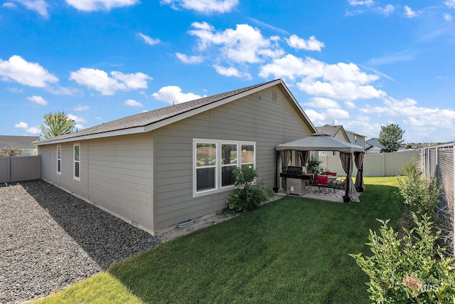 13221 S Clarion River Ave, Nampa, ID 83686 - rear view of house with a gazebo and a patio area