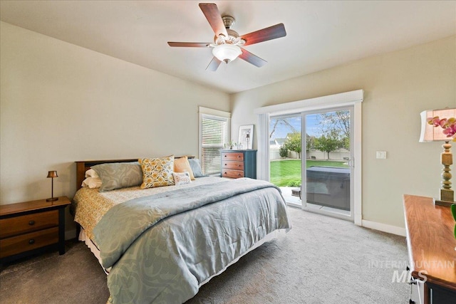 carpeted bedroom featuring baseboards, access to exterior, and ceiling fan
