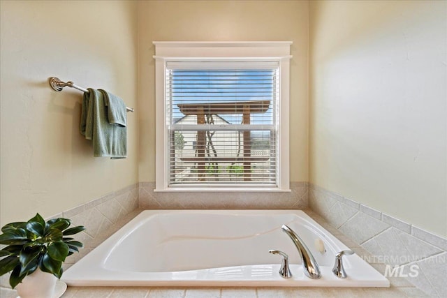 full bathroom with a garden tub