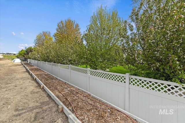view of yard with fence