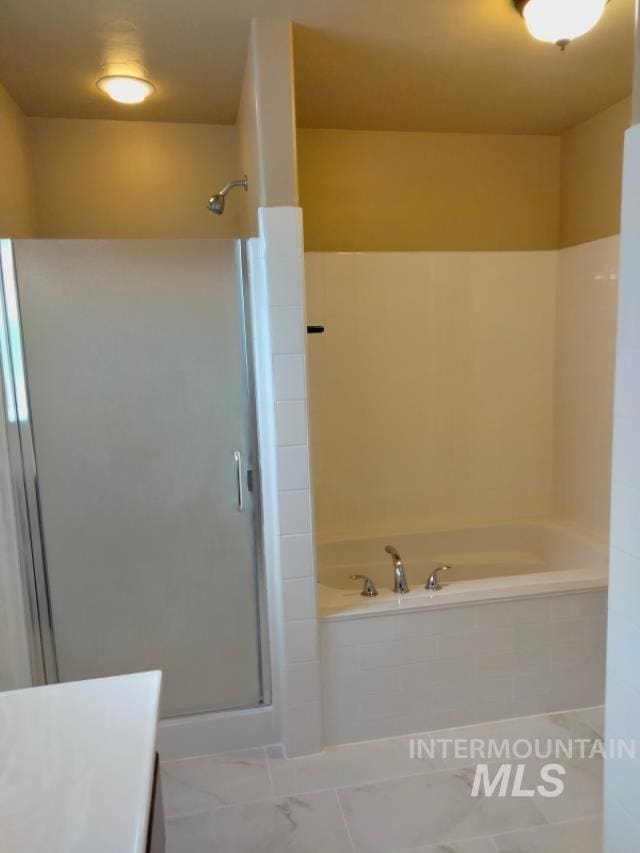841 Gregory Way, Twin Falls, ID 83301 - full bath with a bath, a stall shower, and vanity