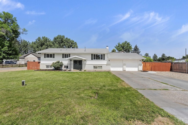 1934 N Cribbens St, Boise, ID 83713 - raised ranch with concrete driveway, a garage, and a chimney