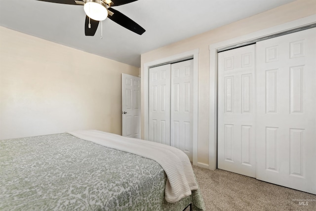 1934 N Cribbens St, Boise, ID 83713 - carpeted bedroom with two closets and a ceiling fan
