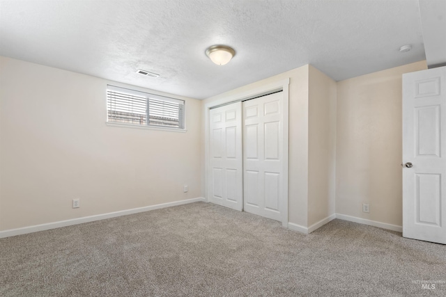 1934 N Cribbens St, Boise, ID 83713 - unfurnished bedroom with carpet floors, a textured ceiling, and a closet