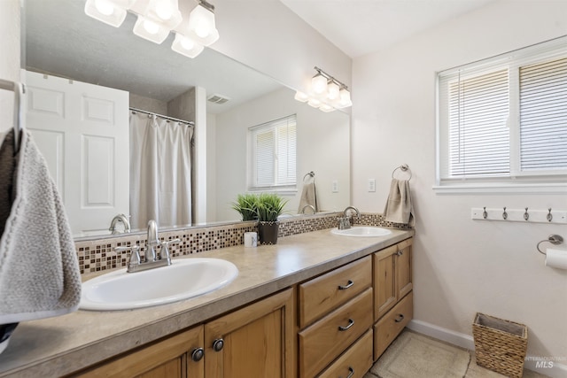 1934 N Cribbens St, Boise, ID 83713 - bathroom with double vanity and tile patterned flooring