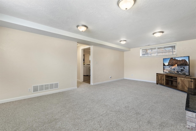 1934 N Cribbens St, Boise, ID 83713 - basement featuring light colored carpet, a textured ceiling, and washer / clothes dryer