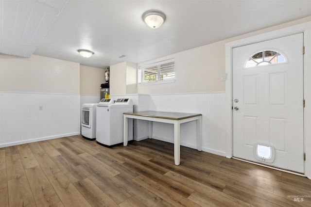 1934 N Cribbens St, Boise, ID 83713 - laundry area featuring separate washer and dryer, a wainscoted wall, wood finished floors, and water heater