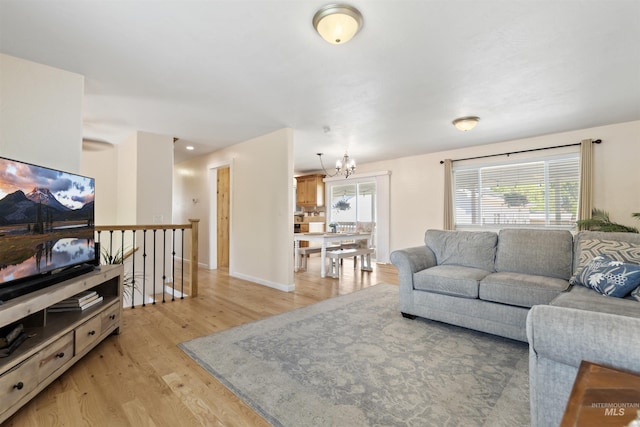 1934 N Cribbens St, Boise, ID 83713 - living area featuring a chandelier and light wood finished floors