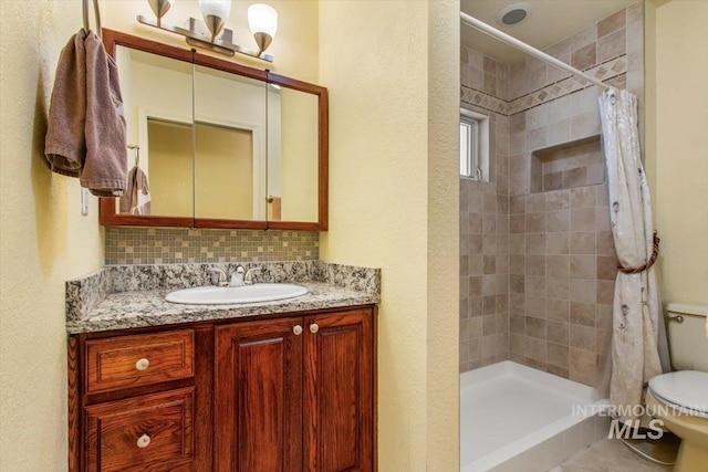 368 W King Rd, Kuna, ID 83634 - bathroom with toilet, a stall shower, vanity, and a textured wall