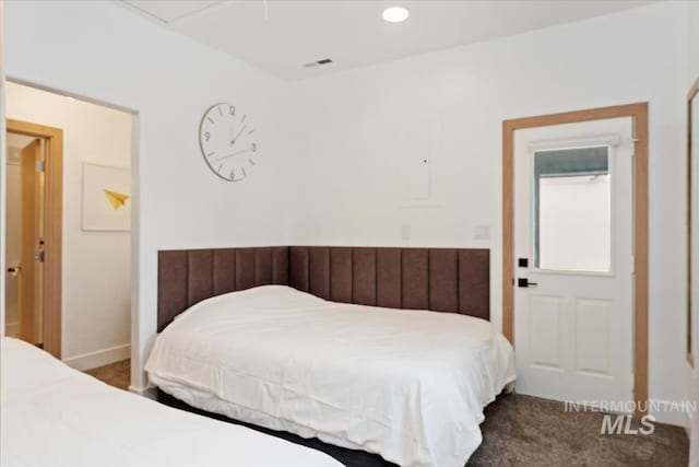 bedroom with carpet flooring and recessed lighting