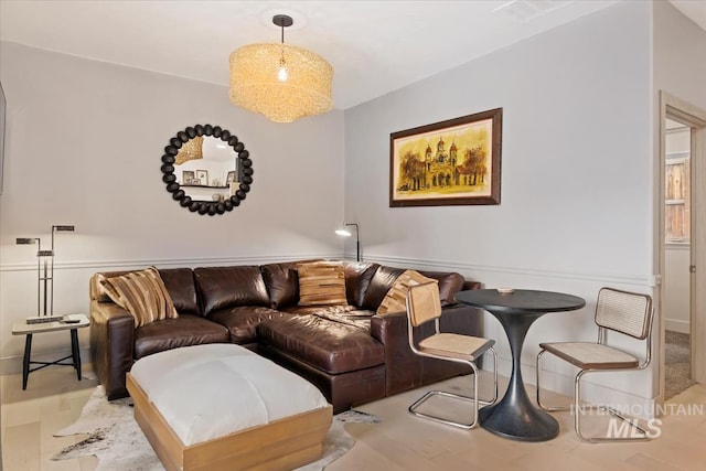 living room featuring visible vents