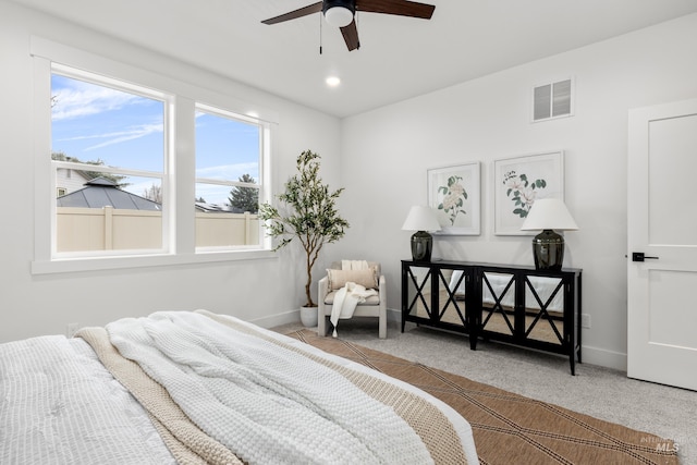 carpeted bedroom with ceiling fan