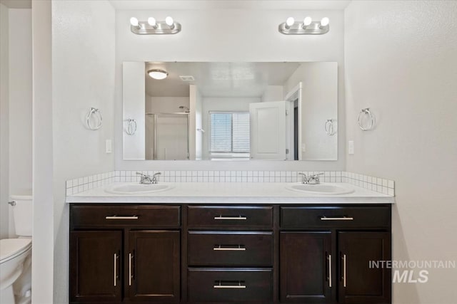 4217 S Leaning Tower Ave, Meridian, ID 83624 - bathroom featuring double vanity and a shower stall