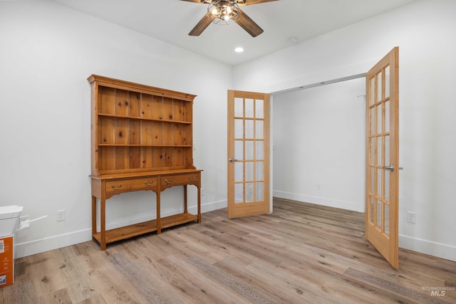 unfurnished room with a ceiling fan, french doors, recessed lighting, baseboards, and wood finished floors