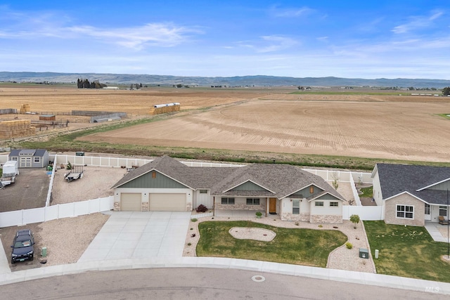 bird's eye view with a mountain view and a rural view