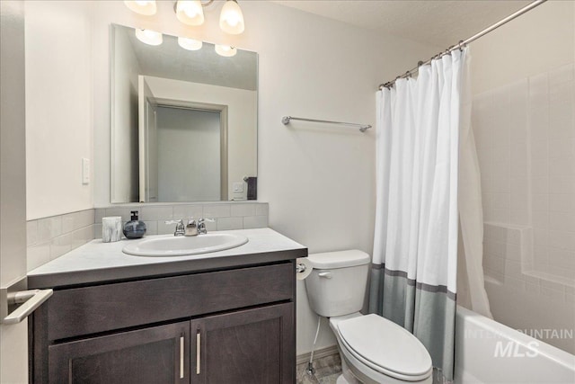 full bathroom featuring decorative backsplash, toilet, shower / tub combo with curtain, and vanity