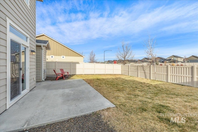 view of yard featuring a fenced backyard and a patio