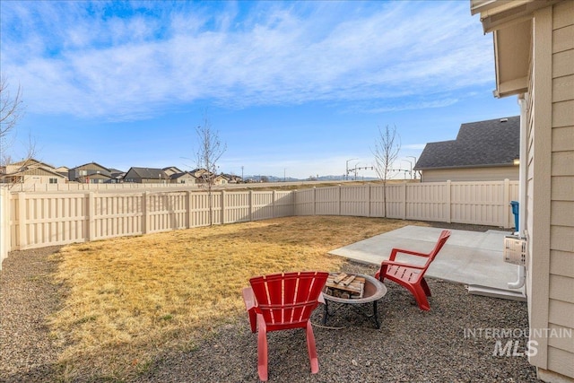 view of yard with a patio area and a fenced backyard