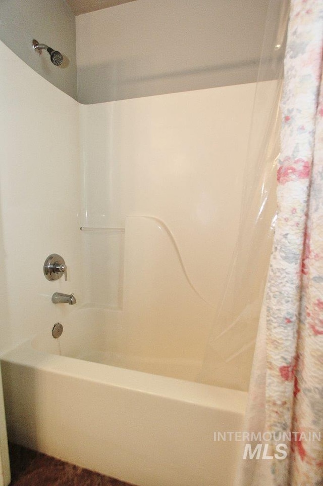 16696 Snowgoose St, Nampa, ID 83687 - bathroom with shower / bath combo with shower curtain