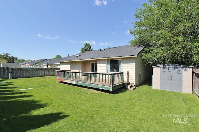 16696 Snowgoose St, Nampa, ID 83687 - back of house featuring a fenced backyard, a deck, and a shed