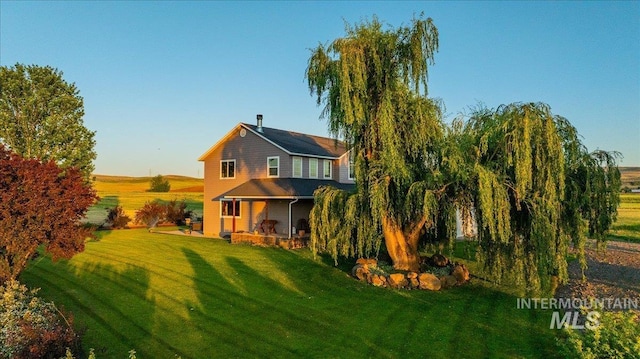 2020 Widner Rd, Midvale, ID 83645 - back of property featuring a yard and a porch