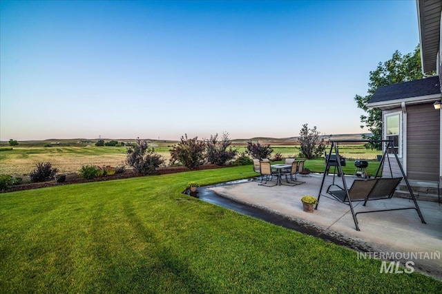 2020 Widner Rd, Midvale, ID 83645 - view of grassy yard featuring a patio area