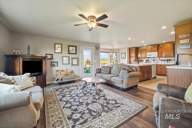 2020 Widner Rd, Midvale, ID 83645 - living room featuring ceiling fan, recessed lighting, and light wood finished floors