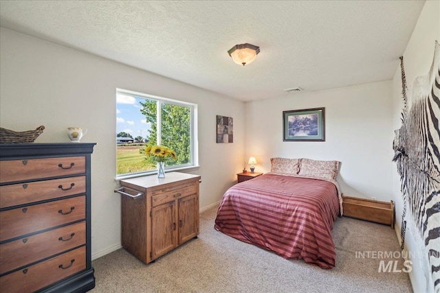 2020 Widner Rd, Midvale, ID 83645 - bedroom with light carpet and a textured ceiling