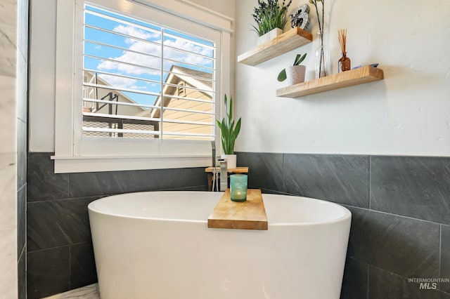 2679 S Tristram Way, Meridian, ID 83642 - full bath with a freestanding tub and tile walls