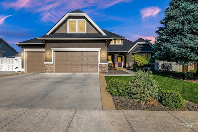 2679 S Tristram Way, Meridian, ID 83642 - craftsman-style home with stone siding, concrete driveway, and stucco siding