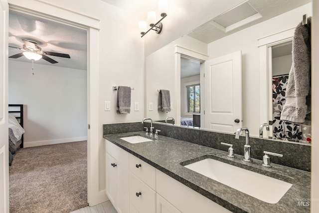 2679 S Tristram Way, Meridian, ID 83642 - bathroom with ensuite bathroom, double vanity, and ceiling fan