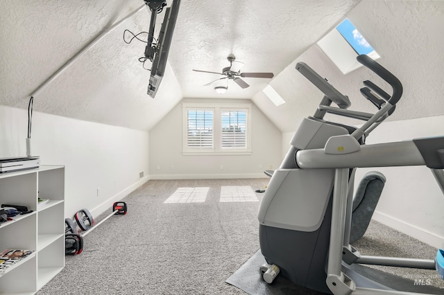 2679 S Tristram Way, Meridian, ID 83642 - exercise area with a textured ceiling, a ceiling fan, baseboards, vaulted ceiling, and carpet flooring