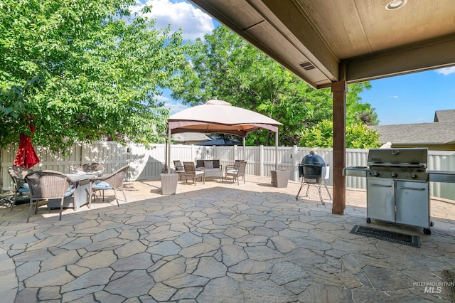 2679 S Tristram Way, Meridian, ID 83642 - fenced backyard featuring outdoor dining area, a patio, and area for grilling