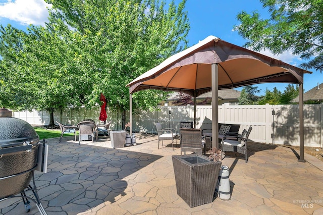 2679 S Tristram Way, Meridian, ID 83642 - fenced backyard with a gazebo, a patio, and outdoor dining area