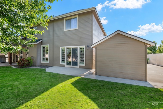 2679 S Tristram Way, Meridian, ID 83642 - back of house with a lawn and a patio area
