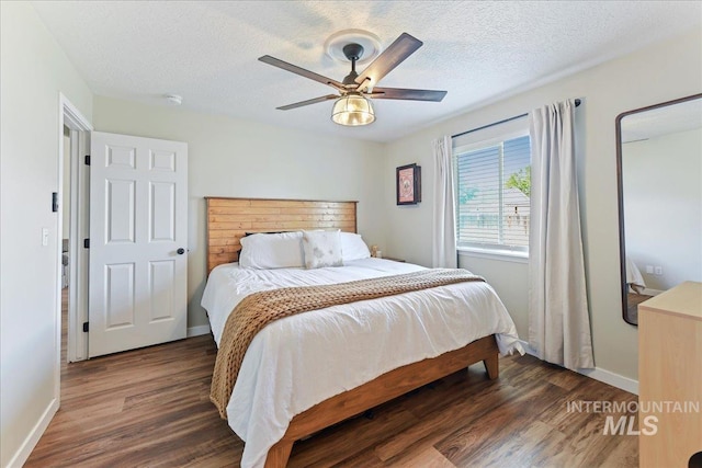 3318 E Princess Amy Ct, Nampa, ID 83687 - bedroom with wood finished floors, baseboards, a textured ceiling, and ceiling fan