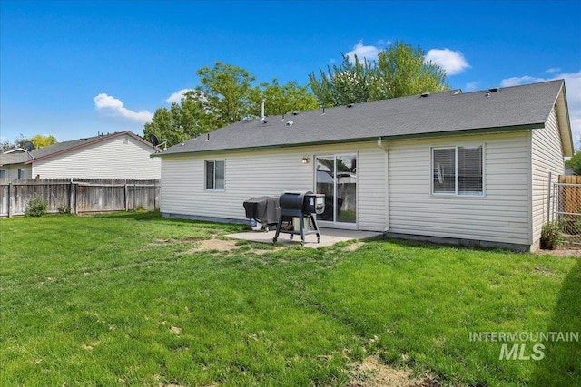 3318 E Princess Amy Ct, Nampa, ID 83687 - back of house with a patio area and a shingled roof