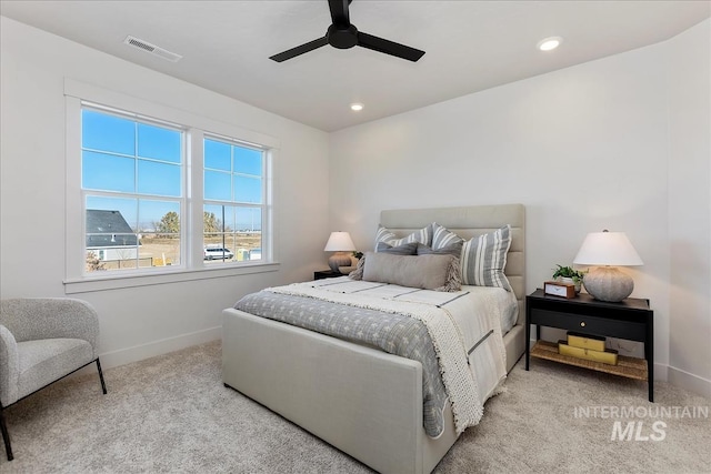 carpeted bedroom with ceiling fan