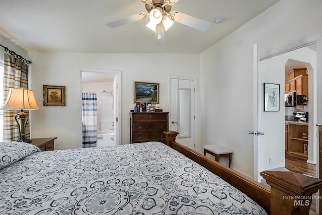 421 Curtis Rd Unit 120, Boise, ID 83705 - bedroom featuring arched walkways, vaulted ceiling, and a ceiling fan