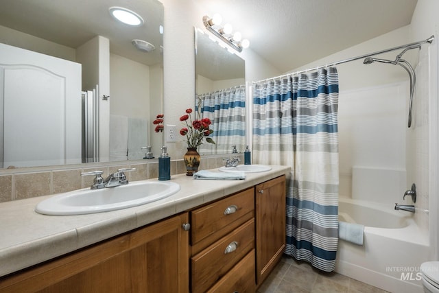 421 Curtis Rd Unit 120, Boise, ID 83705 - full bath featuring double vanity, shower / bath combination with curtain, vaulted ceiling, and tile patterned floors