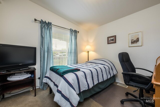 421 Curtis Rd Unit 120, Boise, ID 83705 - carpeted bedroom featuring a desk and lofted ceiling